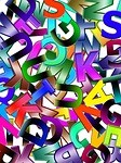 Multicolored jumbled pile of letters A-Z.